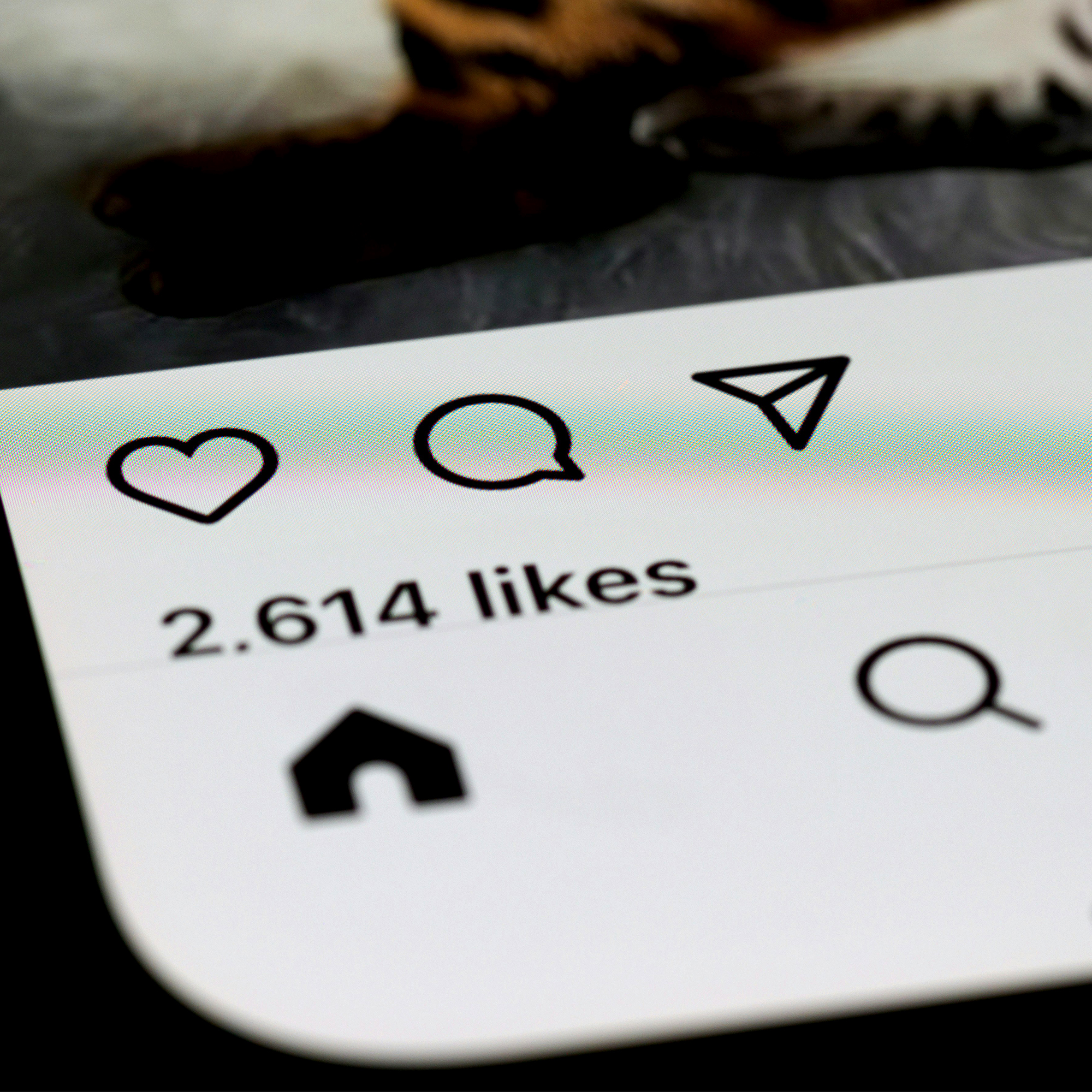 Social media likes on a phone screen